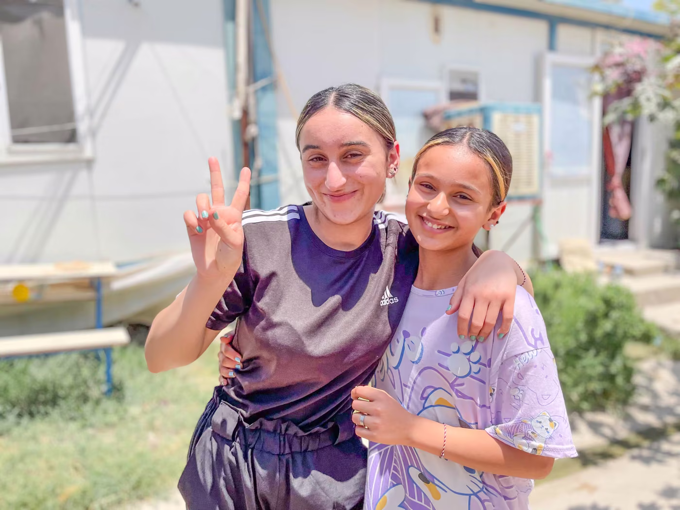 A teenage girl supported through EMERGE's safe spaces and trauma-informed mentoring.